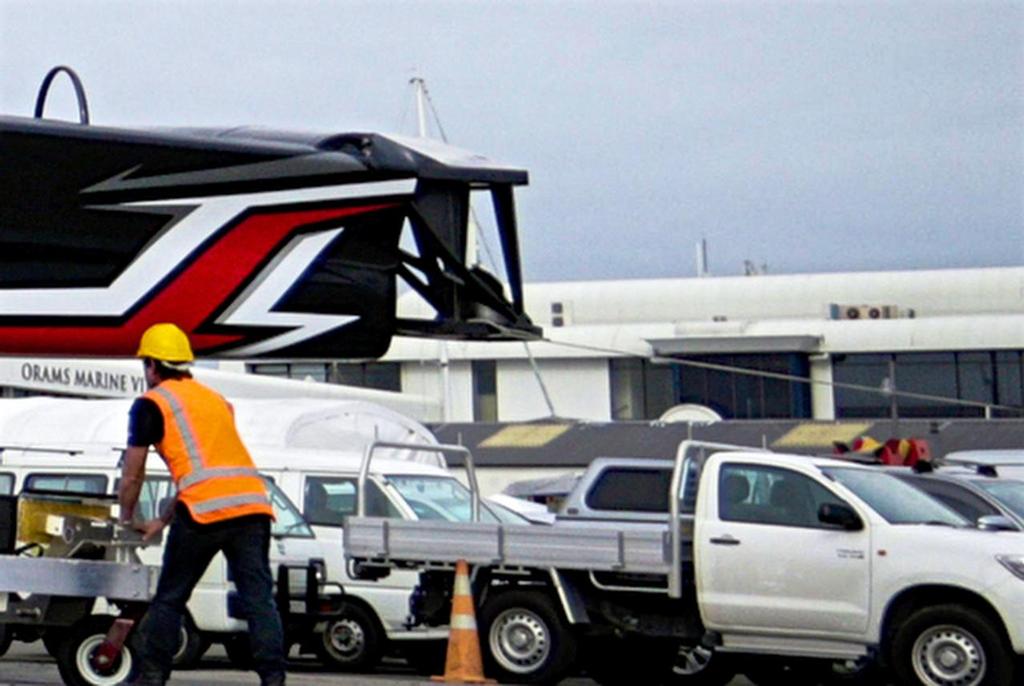 Emirates Team New Zealand launch their first in house designed and built America's Cup AC45 test & development boat at their base in Auckland. The rudder and after foil will hang right at the aft end of the extended rudder gantry - lengthening the standard AC45 by 3ft or more. © Hamish Hooper/Emirates Team NZ http://www.etnzblog.com